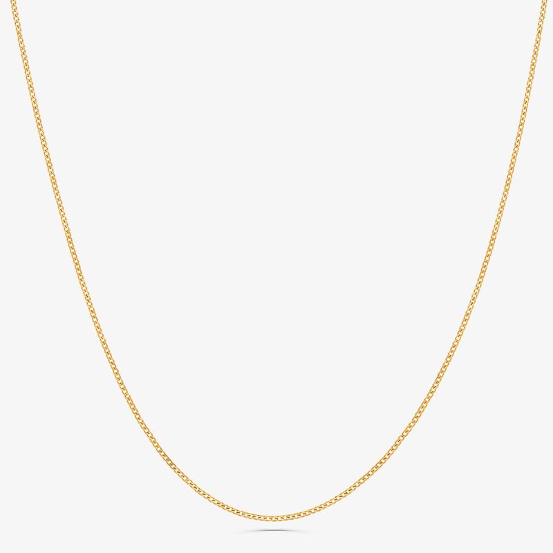 Corrente dourada fina em um fundo branco.